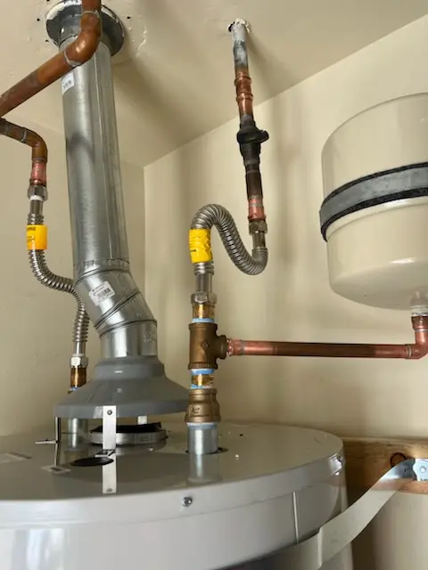 Water heater installation and plumbing repair in Stowe